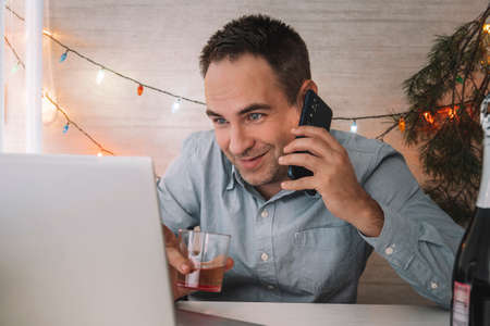 Office clerk celebrate Christmas at work. Celebrating Christmas and New Year in the workplace. An...