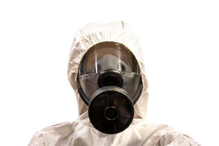 man in chemical protective clothing and half mask replaceable particulate filter respirator with glasses at white background, Safety virus infection conceptの写真素材
