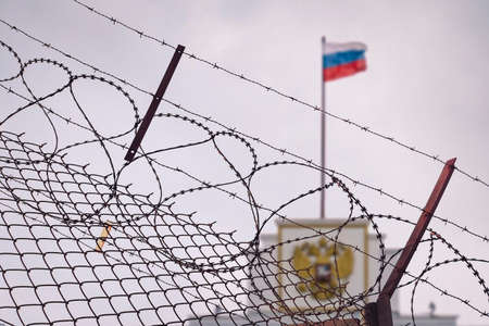 The concept of European and US sanctions pressure on the Russian Federation government. flag of the...