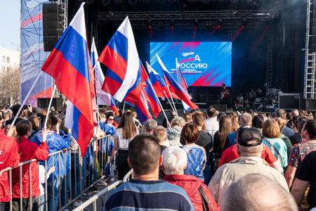 Concert on the street square with Russian flags. April 16. 2022. Barnaul. Russia.のeditorial素材