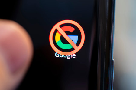 A crossed-out icon google on a black smartphone screen. April 1, 2022 Russiaのeditorial素材