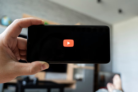 icon of the YouTube on a black smartphone screen. Barnaul Russia, May 15, 2022のeditorial素材
