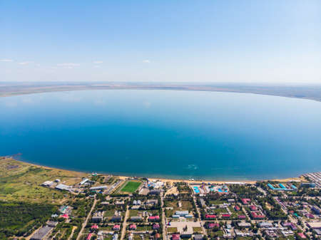 View from top of the city resort by the lake. Aerial view of the city and the lake called yarovoyeの写真素材
