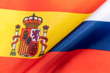 Flags of the spain and Russia. The concept of international relations between countries. Sanctions...