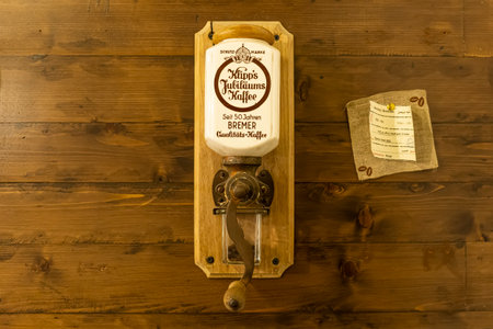 old antique coffee grinder on the table in the coffee museum. Dubai. United Arab Emirates. U.A.E. November 27, 2022のeditorial素材