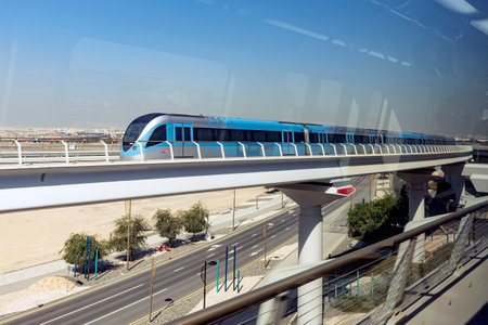 Dubai, United Arab Emirates. November 29th, 2022.: Dubai metro train on rails. Famous outdoor subway...