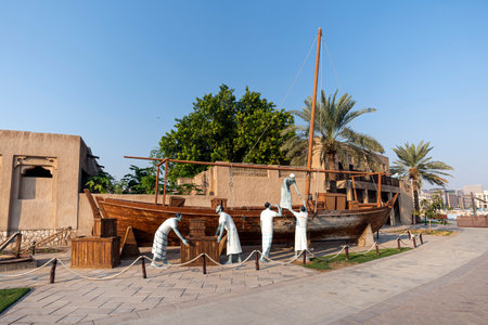 Dubai, U.A.E. November 26, 2022: Old wooden boat at historical are of Dubai. boat installation....
