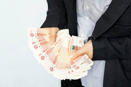Businessman counting money, Russian Ruble currency - financial and wealthy concepts