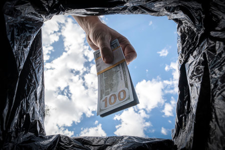 Getting rid of excess cash, switching to non-cash payment. The concept of inflation.の写真素材