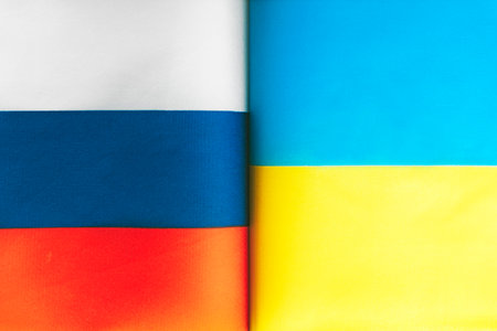 Ukraine VS Russia national flags background, abstract Ukraine Russia politics economy culture history war relationship conflicts conceptの写真素材