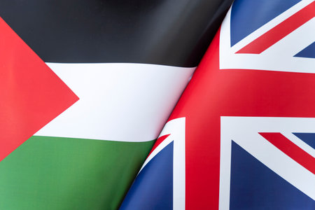 Flags Great Britain and palestine. The concept of international relations between countries. The state of governments. Friendship of peoples.の写真素材