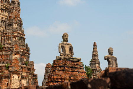 Ruins of ancient city and temples Ayutthaya, Thailand. Old kingdom of Siam. Summer day with blue sky. Famous tourist destination, spiritual place near Bangkok.の写真素材