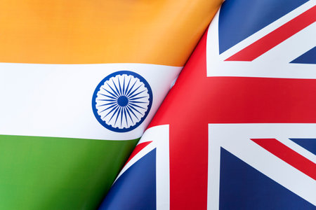 National flag of United Kingdom Great Britain , Union Jack with The Republic of India National flag. backgroundの写真素材