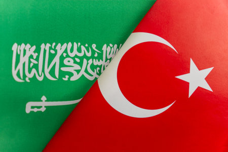 Background of the flags of the Saudi Arabia, Turkey. The concept of interaction or counteraction...
