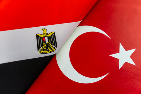 Background of the flags of the Egypt, Turkey. The concept of interaction or counteraction between the two countries. International relations. political negotiations. Sports competition.の写真素材