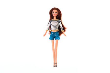 October 9, 2023. Barnaul, Russia: Barbie doll with loose sitting isolated on a white background.のeditorial素材