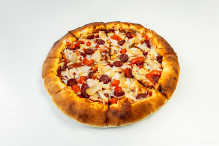 Delicious classic Italian Pizza Pepperoni with sausages and mozzarella cheese on white backgroundの写真素材