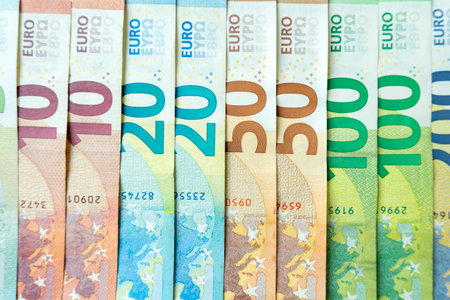beautiful new clean multicolored euro banknotes scattered on the surface. Money concept. Wealth...