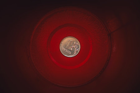 Russian Rubles at the bottom of the iron cans. the concept of the ruble's fall.の写真素材