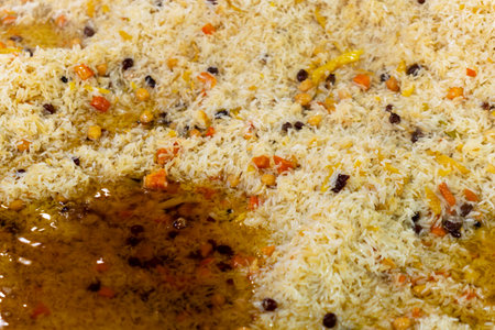 Cooking of plov in the Kazan, cauldron at the Central Asian Plov Centre, Tashkent, Uzbekistanの写真素材