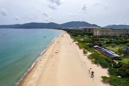 Sanya, Hainan, China. Top View of luxury beach with palm trees against the background of the beauty of the sea with coral reefs. Travel summer holiday background conceptの写真素材