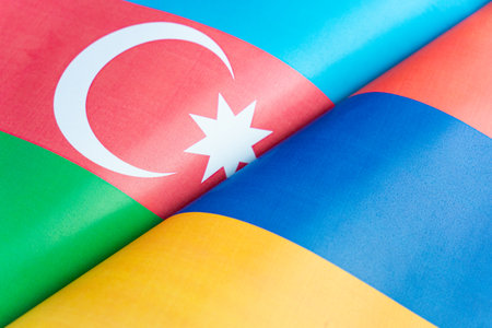Background of the flags of the azerbaijan, armenia. The concept of interaction or counteraction between the two countries. International relations. political negotiations. Sports competition.の写真素材
