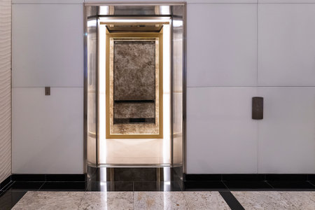 modern elevator with open door, buttons on the wallの写真素材