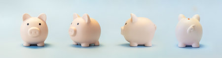 Pink piggy bank on a blue background. concept of preserving and saving money. front viewの写真素材