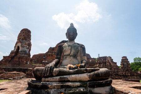 Buddha statue in temple complex at Wat Mahathat in Ayutthaya. Ayutthaya is the ancient ruined capital of kingdom Siam.の写真素材