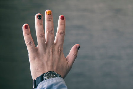 A man with painted nails. Design of male nails. men manicure.の写真素材