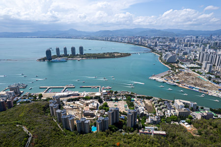 Hainan Sanya Bay architecture urban landscape. Luhuitou Park. Sanya bay. Excellent tourism destination for summer vacation by the sea top view from aboveの写真素材