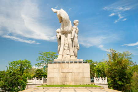 China Hainan island, Sanya city symbol, the girl and the deer turning his headの写真素材