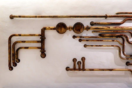 Water supply system installation. Laying pipes in the wall. Cold and hot water supply in the apartmentの写真素材