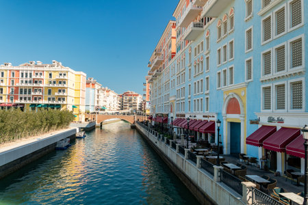 District Little Venice. Beautiful Venetian-style houses and water channels between the houses and bridges over the river. modern European architecture. Qatar. Doha Qanat Quartierの写真素材