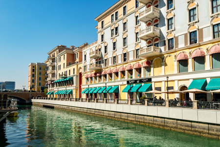 District Little Venice. Beautiful Venetian-style houses and water channels between the houses and bridges over the river. modern European architecture. Qatar. Doha Qanat Quartierの写真素材