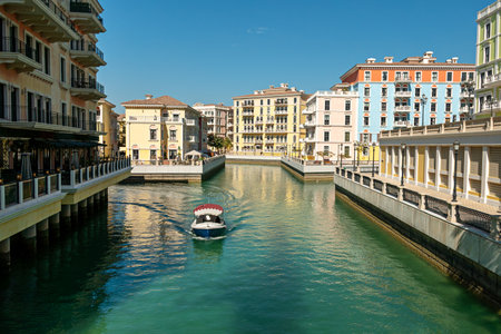 District Little Venice. Beautiful Venetian-style houses and water channels between the houses and bridges over the river. modern European architecture. Qatar. Doha Qanat Quartierの写真素材