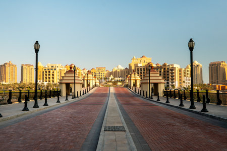 Doha, Qatar: The pearl Marina in Porto Arabia daylight view with Yachts in foregroundの写真素材