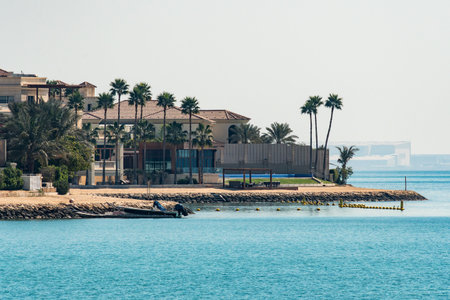 beautiful luxury house with European architecture on the seashore with a beach and turquoise water. luxury real estate. expensive real estate by the sea.の写真素材
