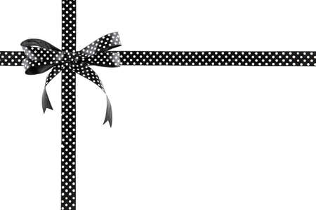 Black and white ribbon with a bow on a white backgroundの写真素材