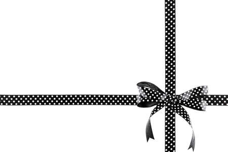 Black and white ribbon with a bow on a white backgroundの写真素材