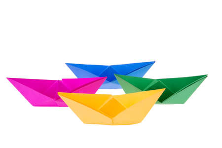 isolated in white boats made of folded colored paperの写真素材