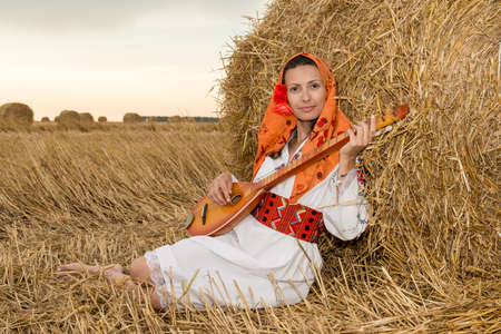 Young woman with national costume from Bulgariaの写真素材