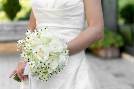Bride with a wedding bouqetの写真素材