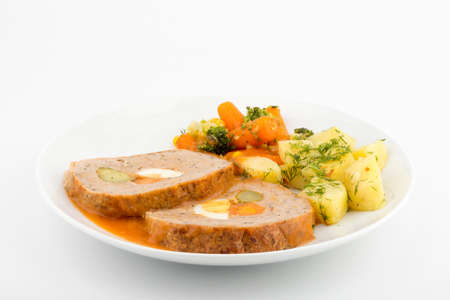 Roll of meat and vegetables. Front view. Selective Focus White background.の写真素材