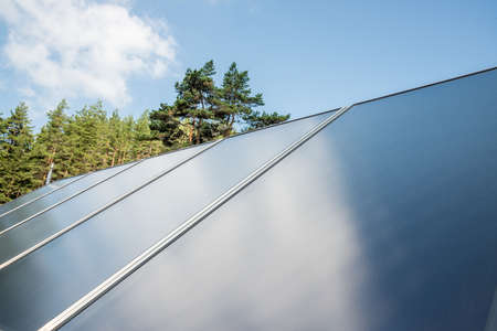 Solar panel on a red roof