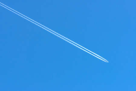 plane flying against blue sky - copy space