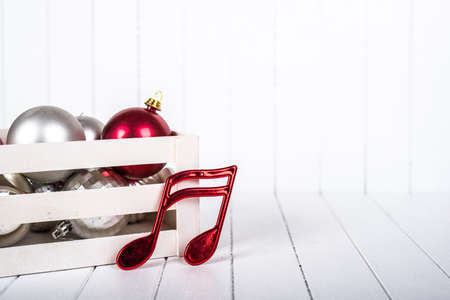 Christmas decorations over a white background - selective focus, copy space