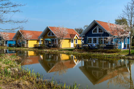 Wooden bungalows and garden on campsiteの写真素材
