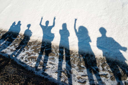 Abstract composition of human shadows on a pile of saltの写真素材