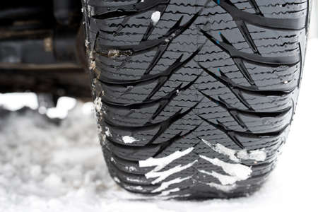 Close up of a tire with winter thread - selective focusの写真素材